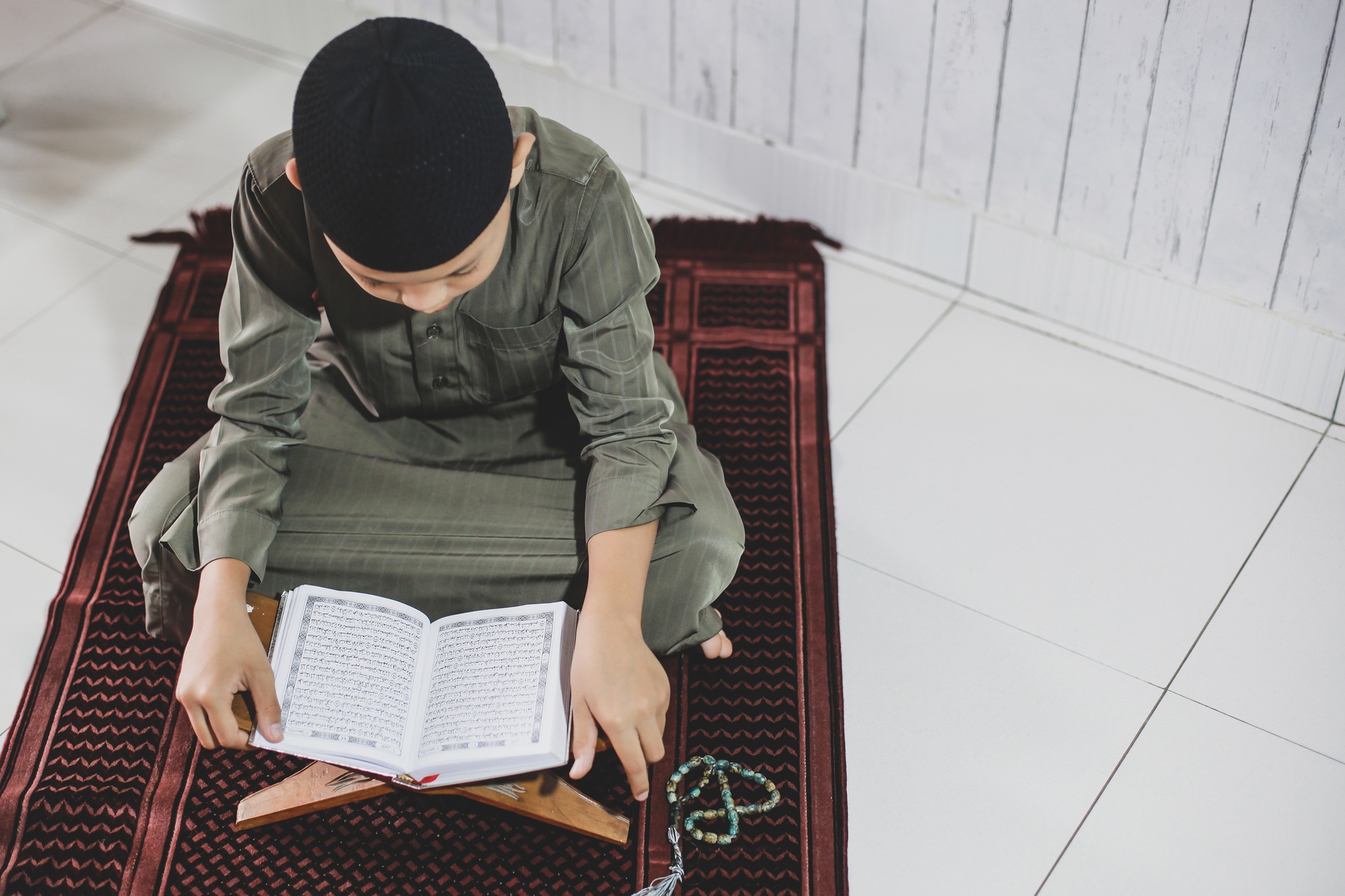 Muslim Boy Reading Holy Quran