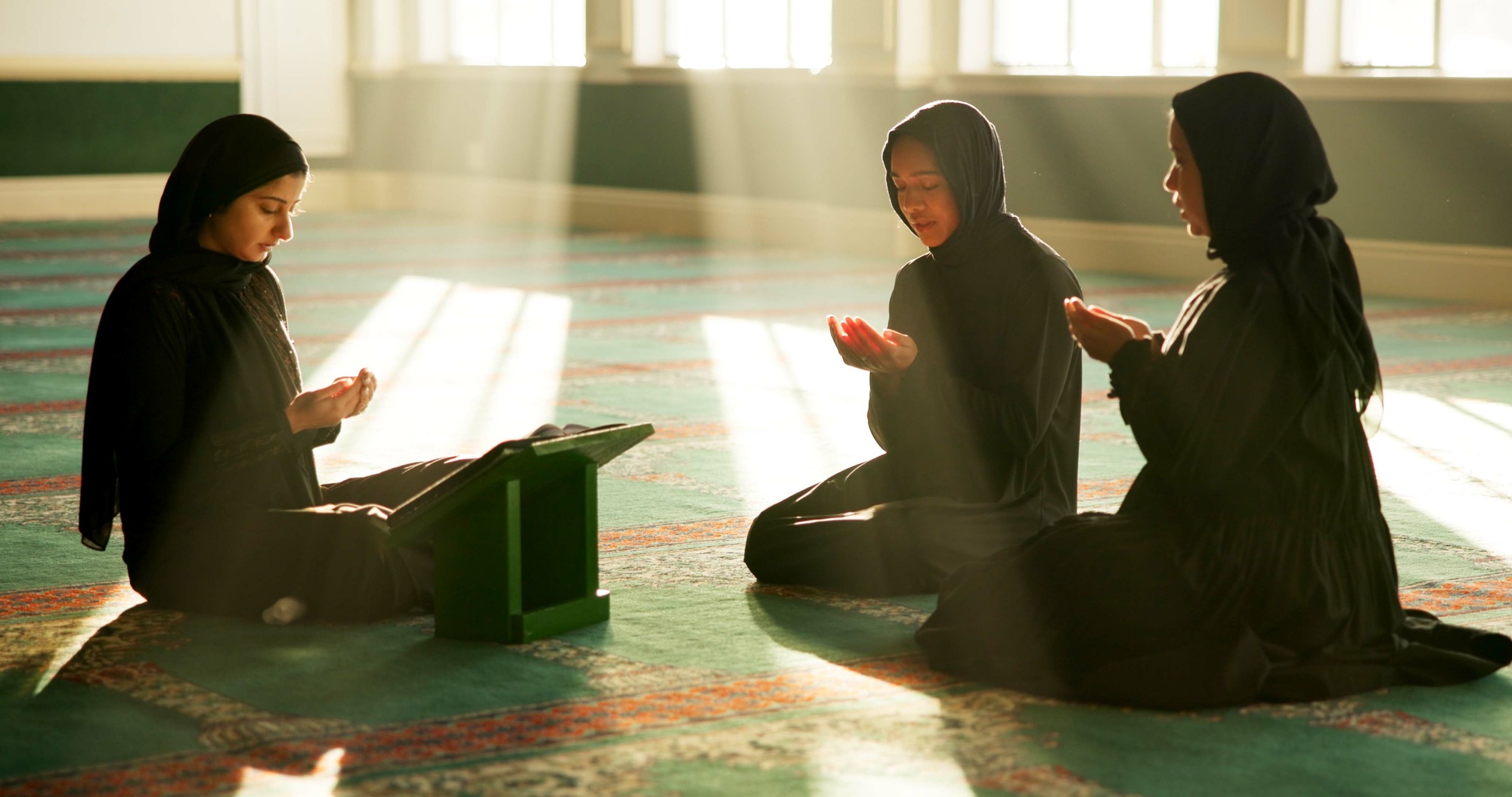 Quran, learning or Muslim women in mosque to worship for Palestine, learning or gratitude to Allah.